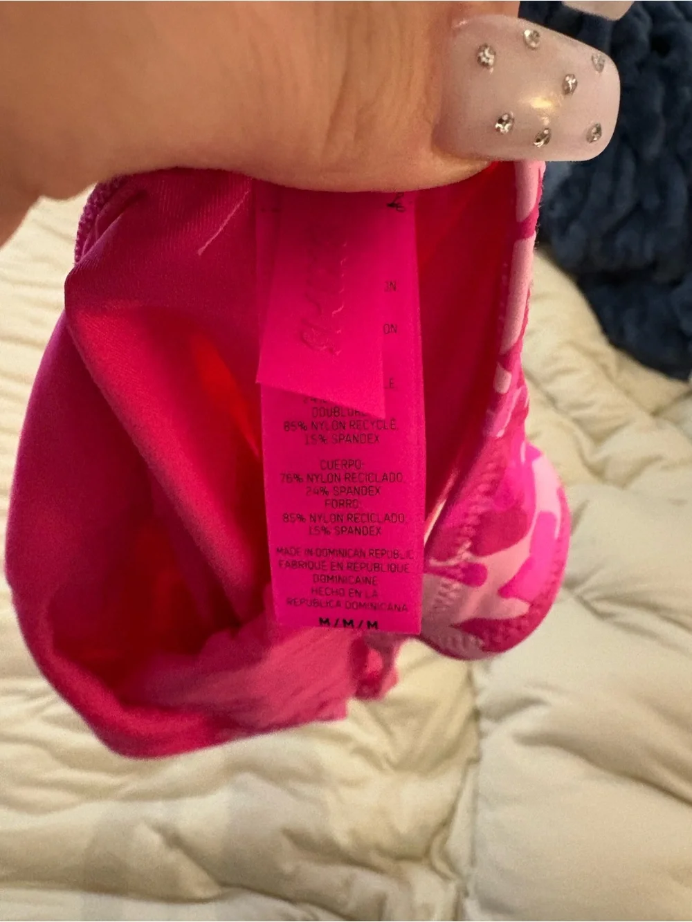 Women’s SKIMS pink camoflauge one piece bathing suit, size medium great conditio